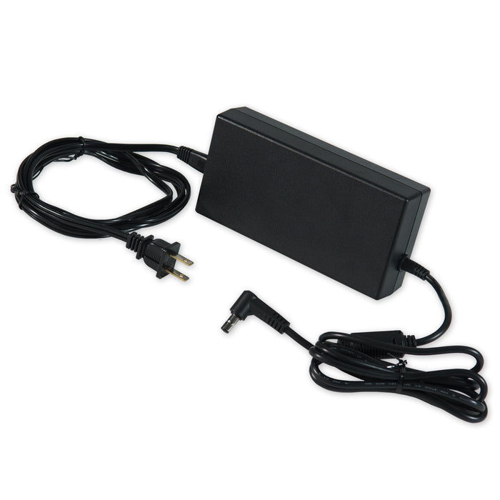 Black power adapter with cables on a white background