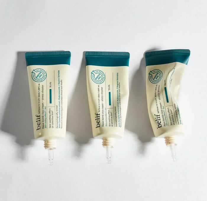 Three tubes of belif Aqua Bomb Cica Cream Stress Shooter moisturizer on white background