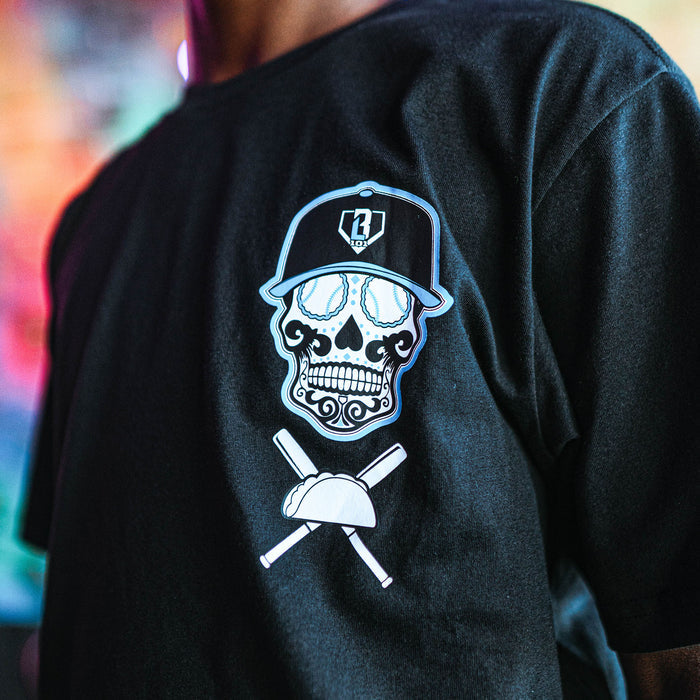 Black t-shirt with a skull and crossbones design on the back, featuring a BL101 cap and baseball bat.