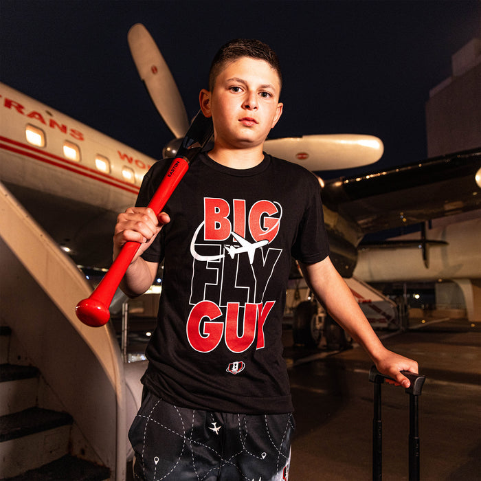 Youth model wearing black Big Fly Guy Red Eye youth graphic tee