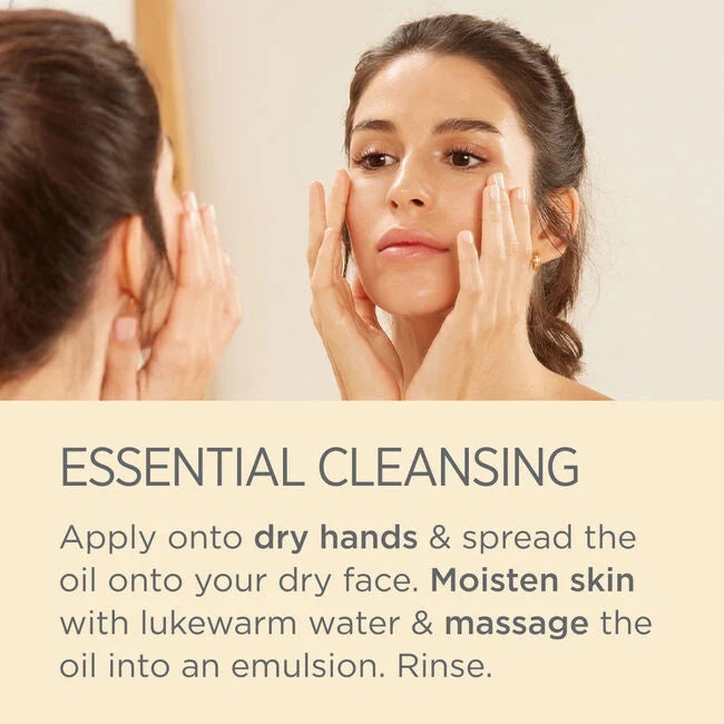 Woman massaging cleanser onto face with Essential Cleansing instructions