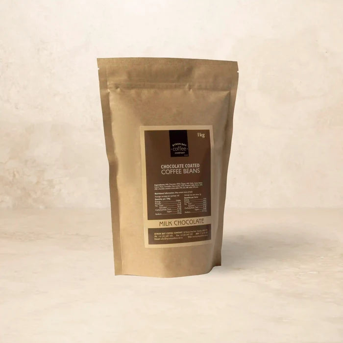 Sweet coffee snack - roasted coffee beans covered in creamy milk chocolate