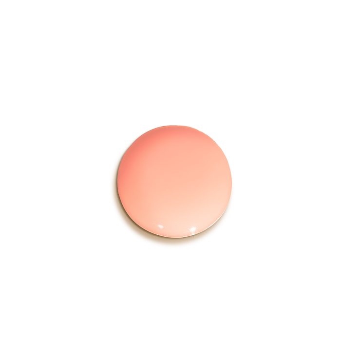 Round pink serum on a white background
