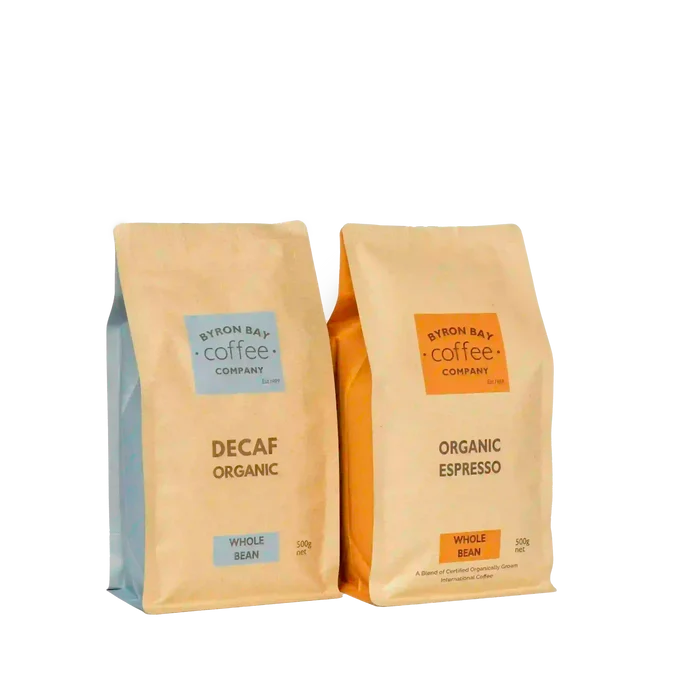 Organic and decaf coffee beans from Byron Bay Coffee Company side by side