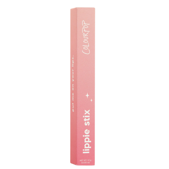 ColourPop Lippie Stix Primer stands upright, a pink ombré rectangular box displaying white “lippie stix” and “ColourPop” text with small star icons and net wt. 1.0 g (0.035 oz), set against a clean white background.