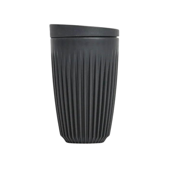 Black textured tumbler on a white background