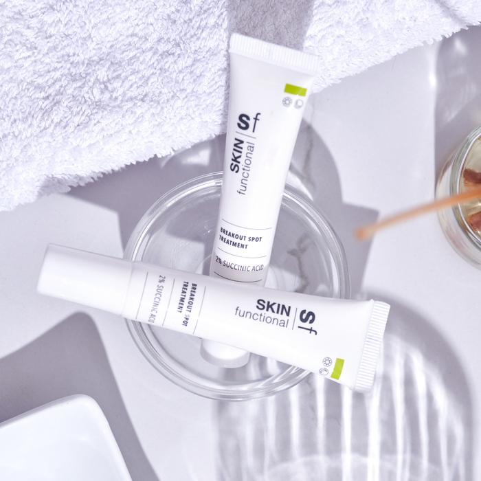 SKIN Functional Breakout Spot Treatment with product details skincare product on a light gray background