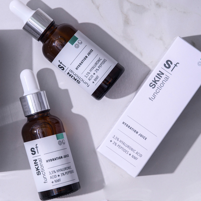 SKIN Functional hydration juice treatment with details skincare product on a grey background