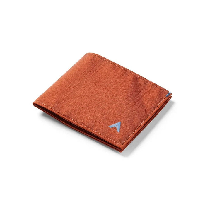 Beads of water on the ALLETT Sport Wallet in RFID-blocking nylon (Potter’s Clay) show its water-resistant, ripstop fabric and minimalist design.