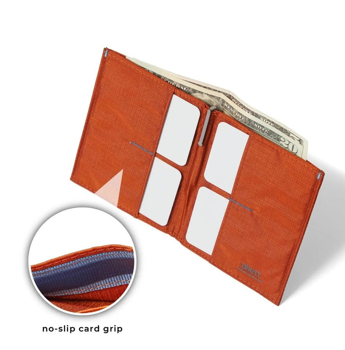 An ultra-slim, closed ALLETT wallet in RFID-blocking Potter’s Clay nylon, featuring a small gray or light blue "A" logo on the bottom right, shown on a white background.