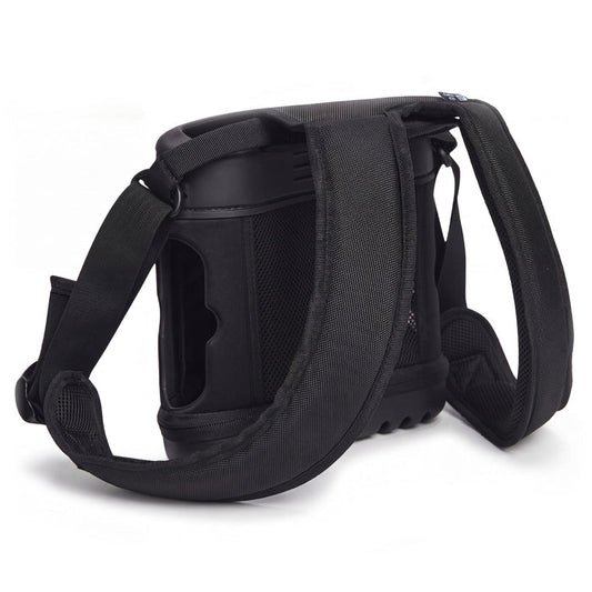 A black tactical shoulder bag with a wide padded strap and a cylindrical side compartment, shown from a three-quarters angle on a white background.