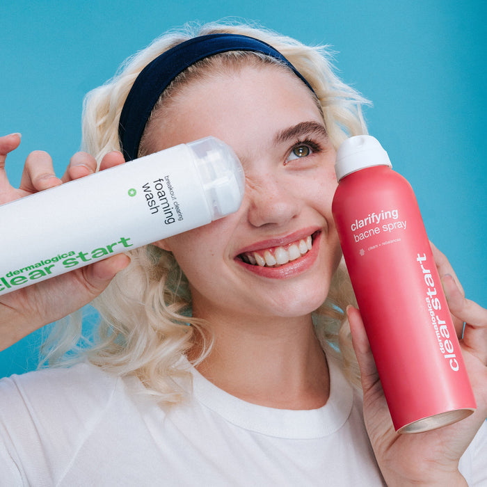 model holding breakout clearing foaming wash and clarifying bacne spray