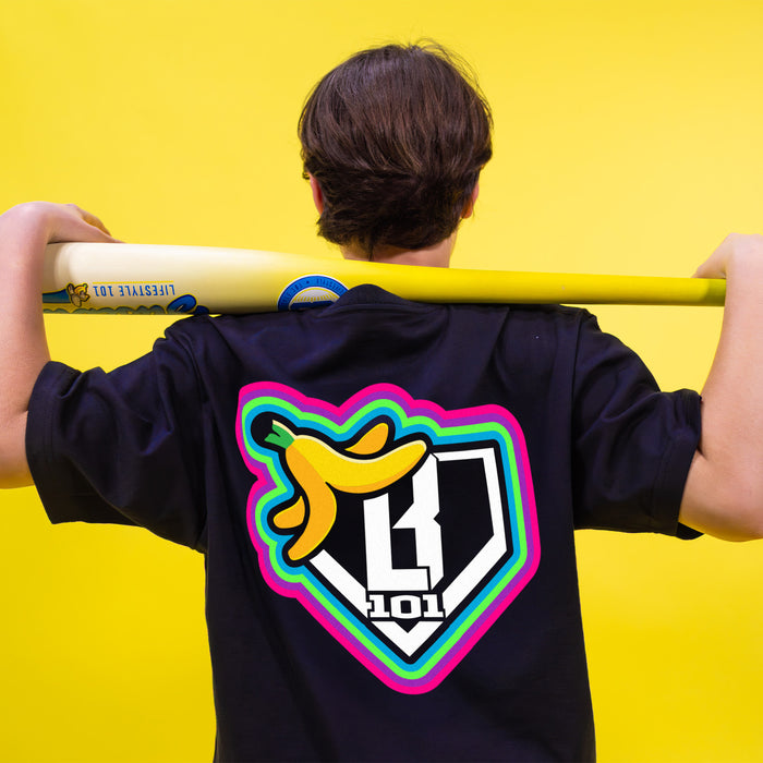 Youth model wearing black Banana Neon youth graphic tee