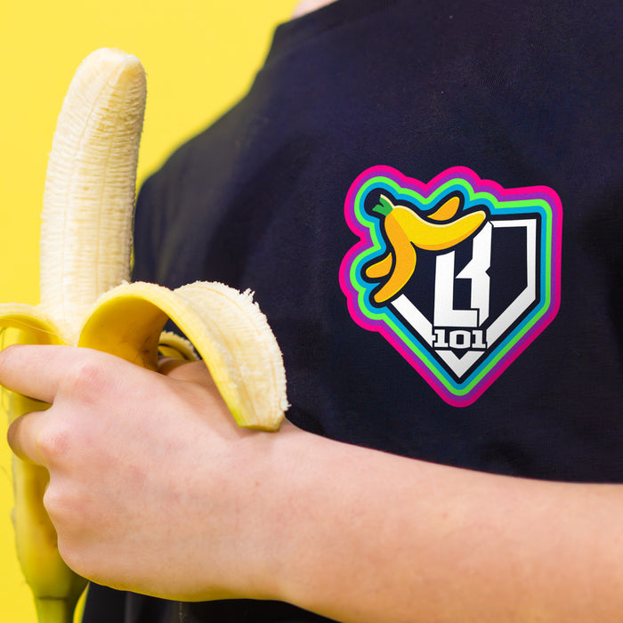 Youth model wearing black Banana Neon youth graphic tee