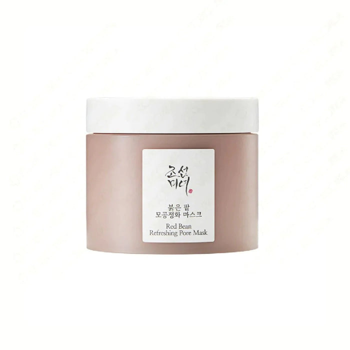 BEAUTY OF JOSEON Red Bean Refreshing Pore Mask is a purifying mask that deeply cleanses and refreshes the skin. Formulated with Red Bean Extract and Kaolin, it helps to absorb excess oil and unclog pores, leaving your skin smooth and refined. The mask also contains Pear and Strawberry Extracts to nourish and brighten the complexion, making it ideal for achieving a clear and refreshed look.