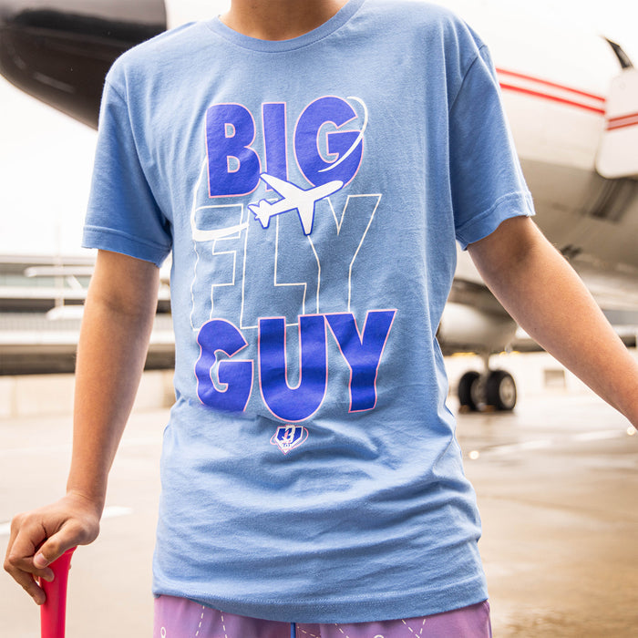 Youth model wearing blue Big Fly Guy Sunrise youth graphic tee