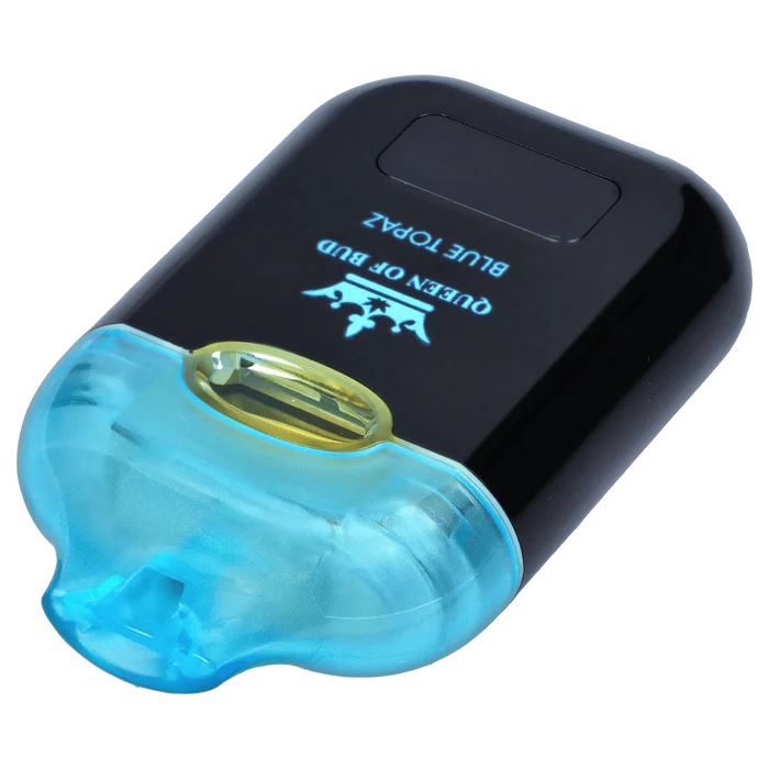 Angled close-up of a glossy black device with a translucent blue mouthpiece showing the Blue Topaz Liquid Crystals Disposable Vape.