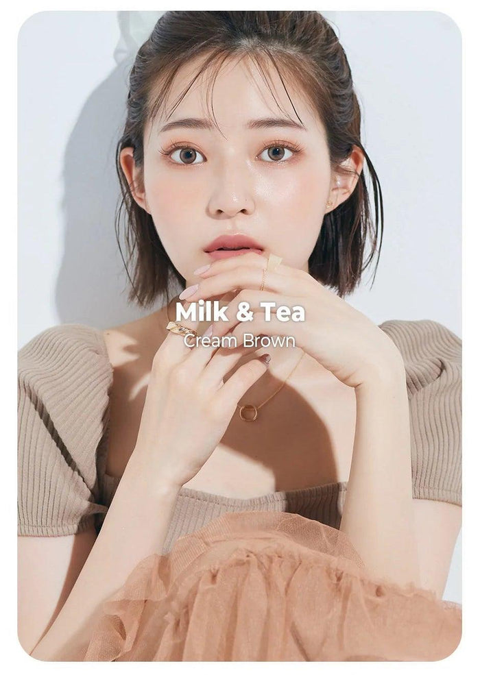 Asian model demonstrating a K-idol-inspired look with Chuu Milk & Tea Cream Brown coloured contact lenses, highlighting the instant brightening and enlarging effect of the circle contact lenses over dark irises.