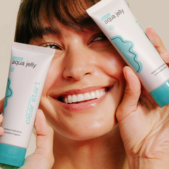 Model holding Cooling Aqua Jelly bottles to face