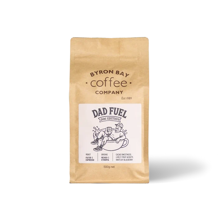 A 500g bag of Byron Bay Coffee Company 'Dad Fuel' coffee in a brown kraft paper pouch with a white label, shown on a clean white background.