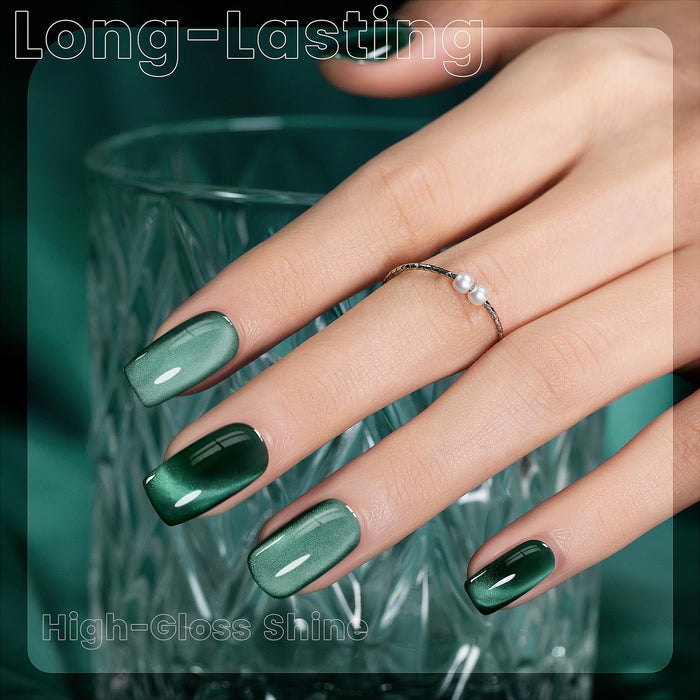 Long-lasting dark green cat eye gel polish on nails sage to forest green gradient high-gloss shine elegant
