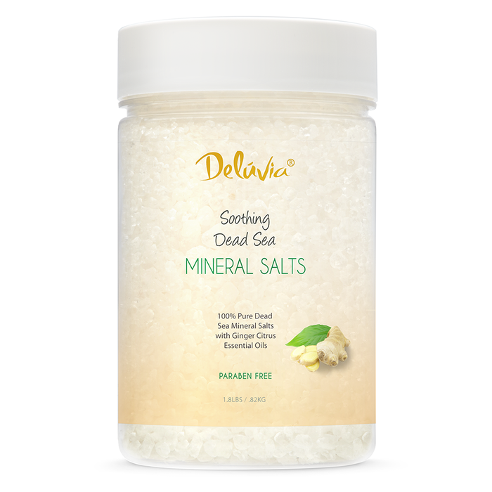 A jar of Deluvia Dead Sea Mineral Salts Ginger Citrus Bodycare
