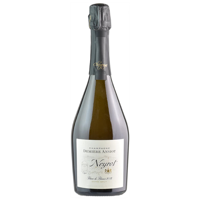 Champagne bottle with dark foil neck wrap and cream label