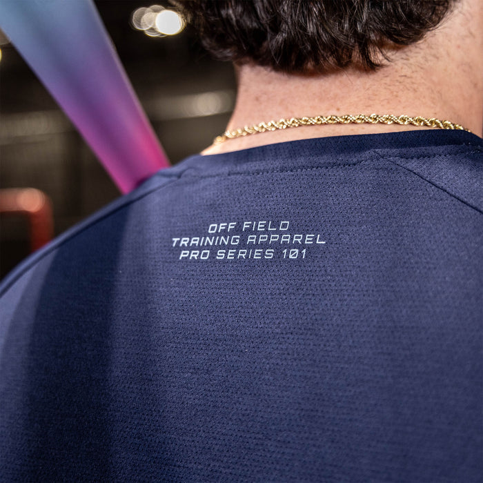 athlete wearing navy athletic shirt