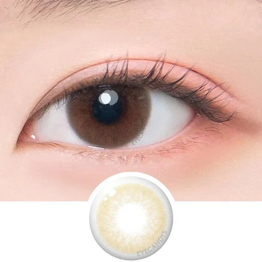 Macro shot of an eye wearing the DooNoon Ppeum 1-Day Brown (10pk) prescription colour contact lens, showing the multi-colored detail and natural effect on dark brown eyes, with clean eye makeup. At the bottom is the pattern of the colored lens design, showing the dotted detail and pigmentation.