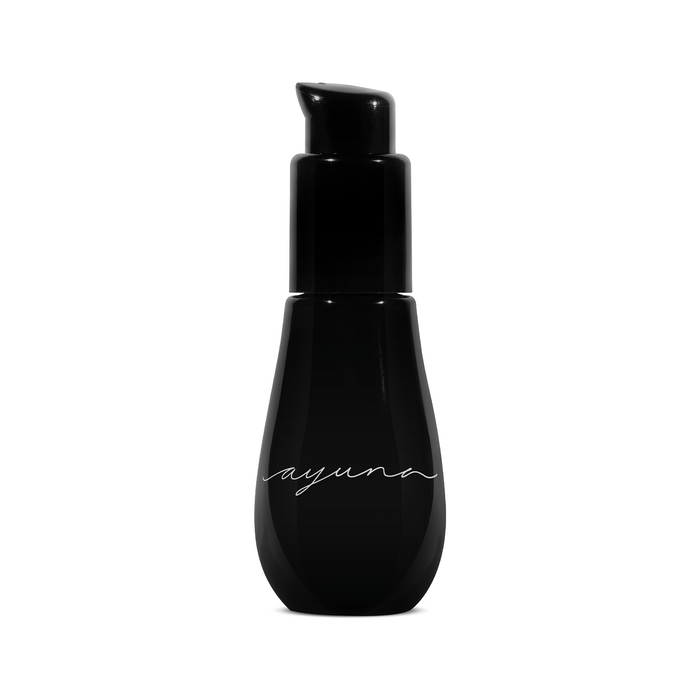 A black bottle with a pump dispenser labeled 'ayuna' containing eye serum.