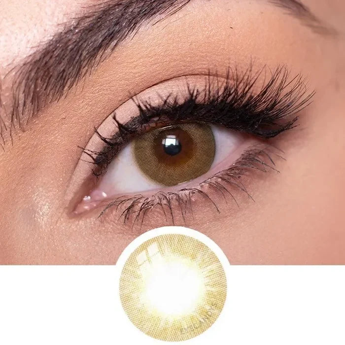 Closeup of the Libre Brown Color Contact Lens worn on a dark eye, with a thumbnail showing the color lens pattern.