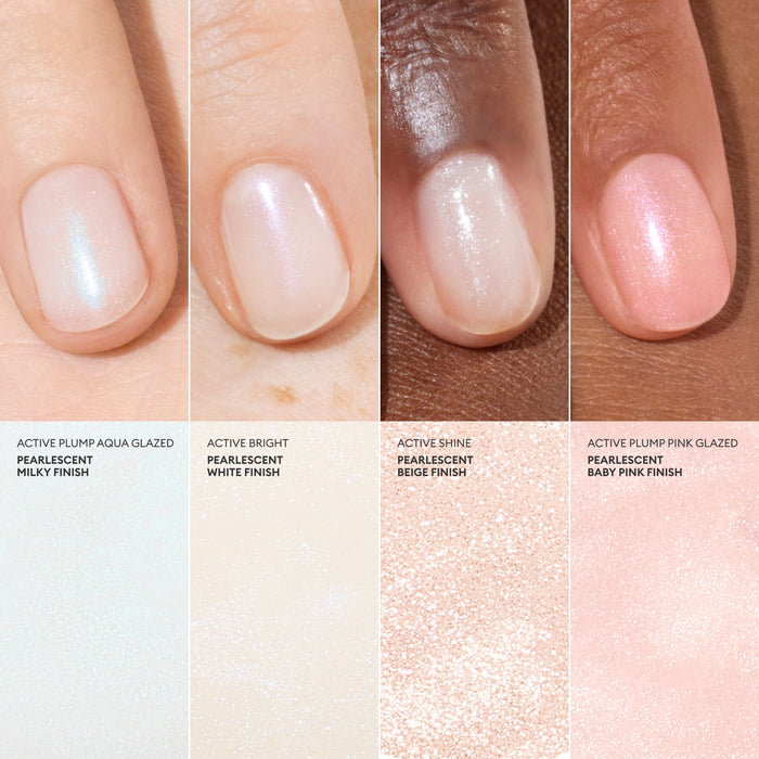 Four manicured fingernails display different shades of Manucurist Active™ Bright bio-based nail polish—milky, white, beige, and pink—each with a glossy finish on various skin tones, beautifully showcasing a healthier nail care alternative.