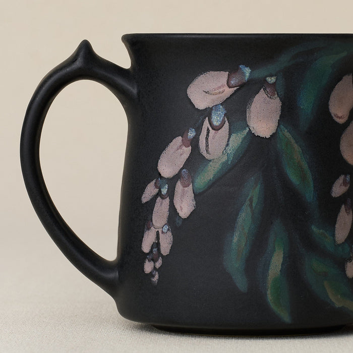 Close-up details of hand-thrown mug by Rookwood
