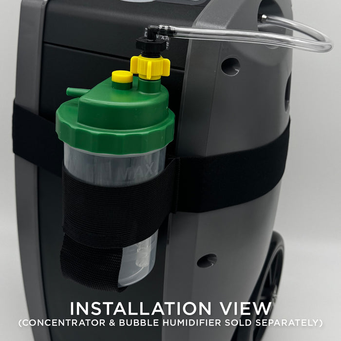 Close-up of a green and yellow component attached to a black machine with text indicating installation view.