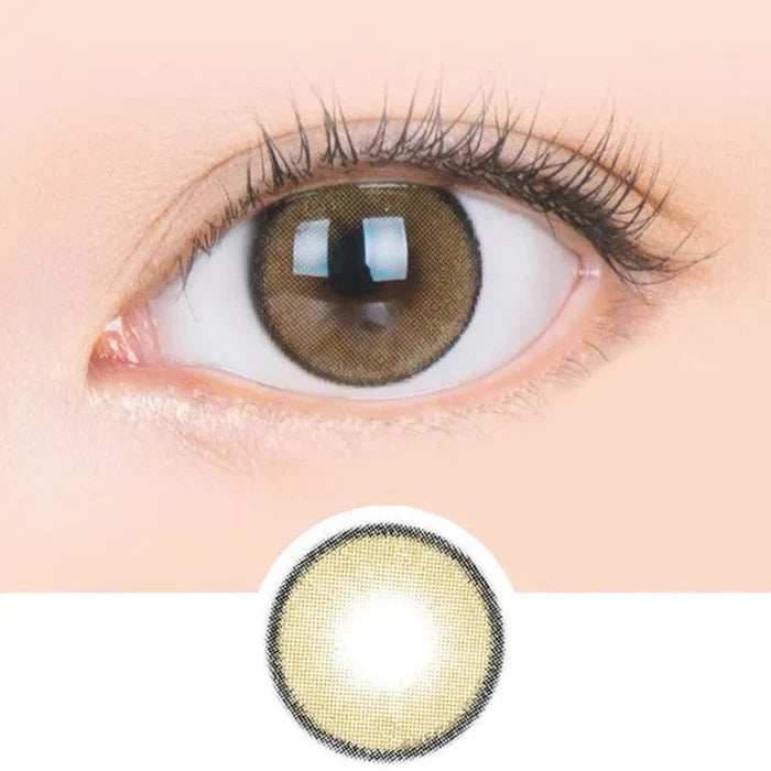 Macro shot of an eye wearing the i-Sha Jadey Stone Brown prescription colour contact lens, showing the multi-colored detail and natural effect on dark brown eyes, with clean eye makeup. At the bottom is the pattern of the colored lens design, showing the dotted detail and pigmentation.