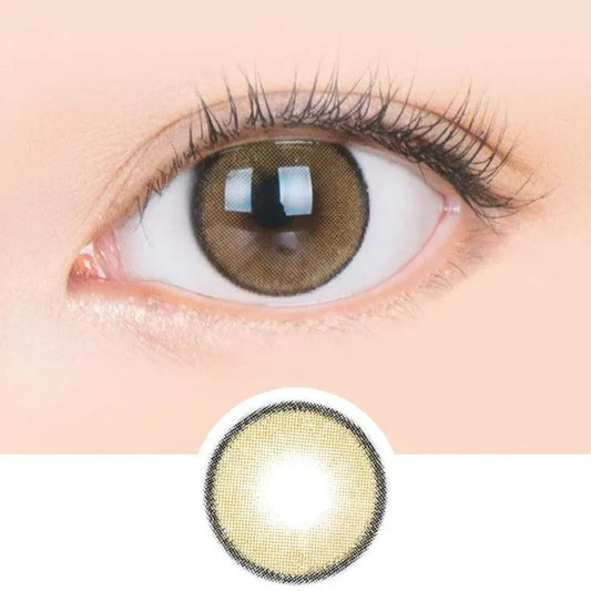 Macro shot of an eye wearing the i-Sha Jadey Stone Brown prescription colour contact lens, showing the multi-colored detail and natural effect on dark brown eyes, with clean eye makeup. At the bottom is the pattern of the colored lens design, showing the dotted detail and pigmentation.
