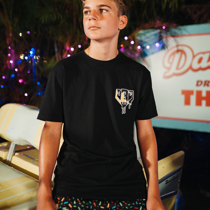 Youth model wearing black Ice Cream Midnight Sundae youth graphic tee