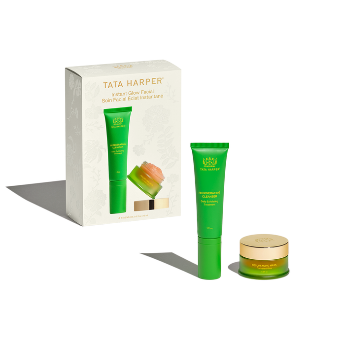 Tata Harper Balanced Glow Facial Set featuring a green facial cream tube, a gold jar, and the white product box on a clean white background.
