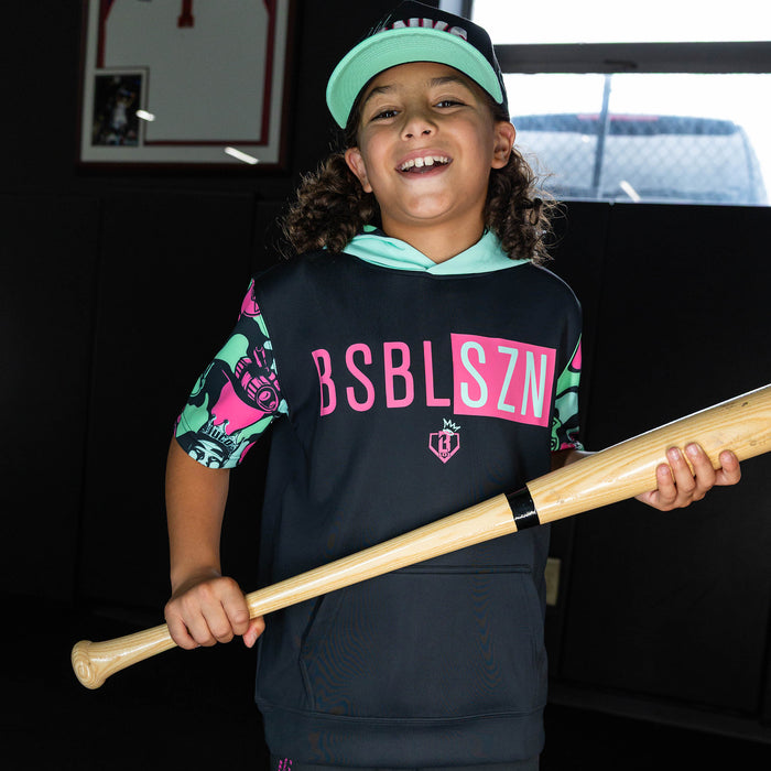 Youth model wearing black short sleeve hoodie with "King Of JUCO BSBL-SZN V3" design