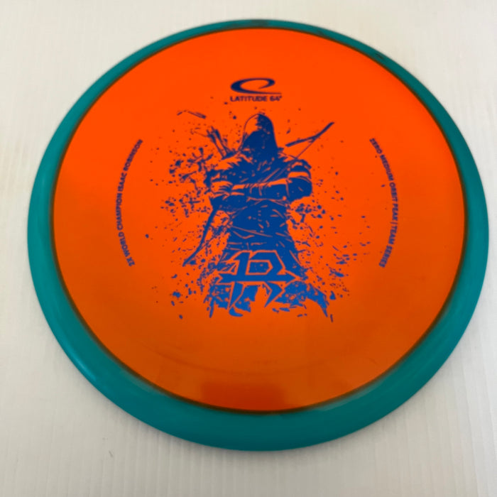 Teal Orbit with an Orange Plate/Blue Stamp173g