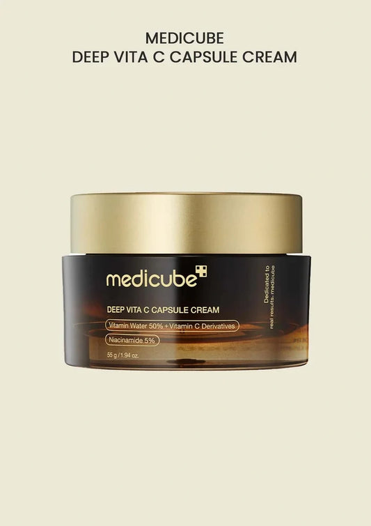 Medicube Deep Vita C Capsule Cream jar on a beige background