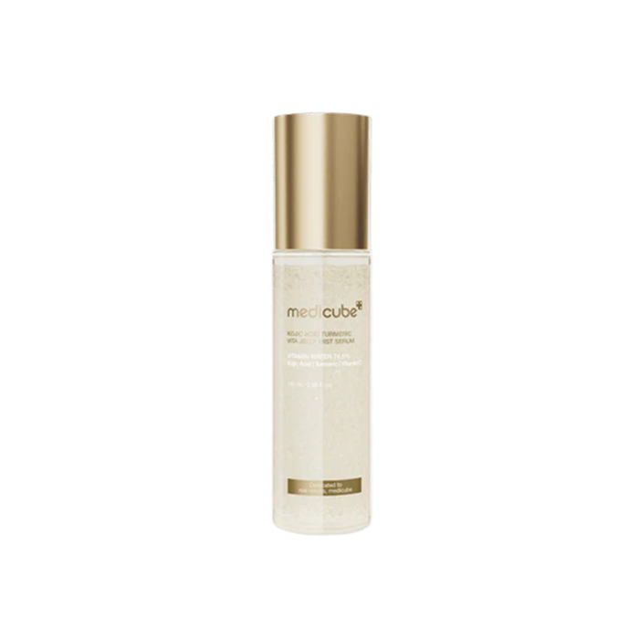 MEDICUBE Kojic Acid Turmeric Vita Jelly Mist Serum is a refreshing mist-serum designed to brighten, hydrate, and revitalize the skin throughout the day. Formulated with Kojic Acid and Turmeric Root Extract, it helps improve uneven skin tone and dullness while supporting a clearer complexion. Multiple forms of Hyaluronic Acid deliver lightweight hydration, while Niacinamide, Panthenol, and Allantoin help soothe and strengthen the skin barrier. The fine jelly mist texture absorbs quickly, making i