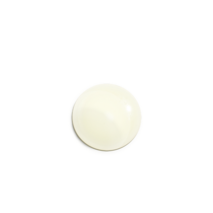 A light cream colored serum on white background