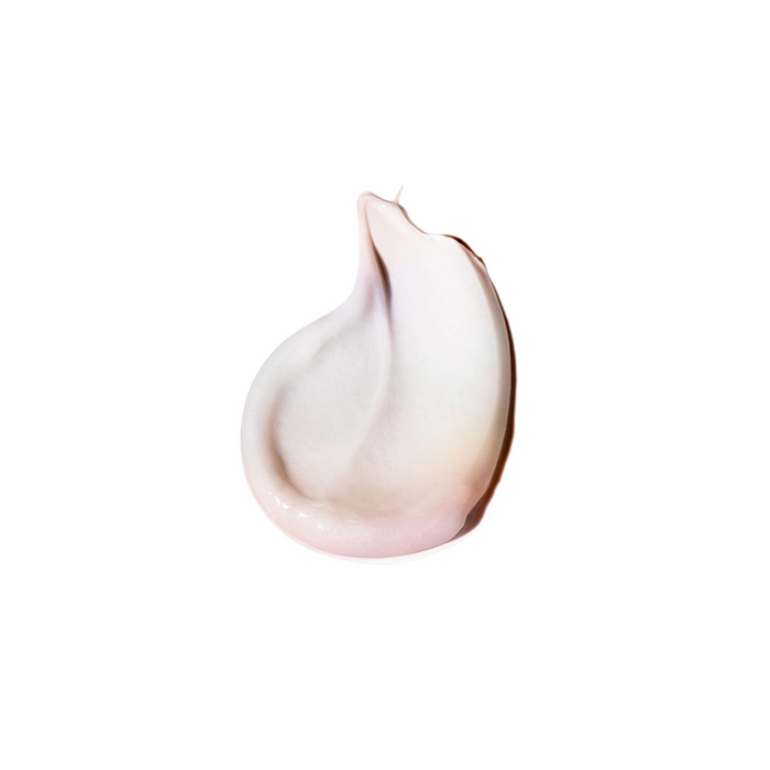 A smooth, thick smear of light pinkish-mauve cream cosmetics isolated on a solid white background.