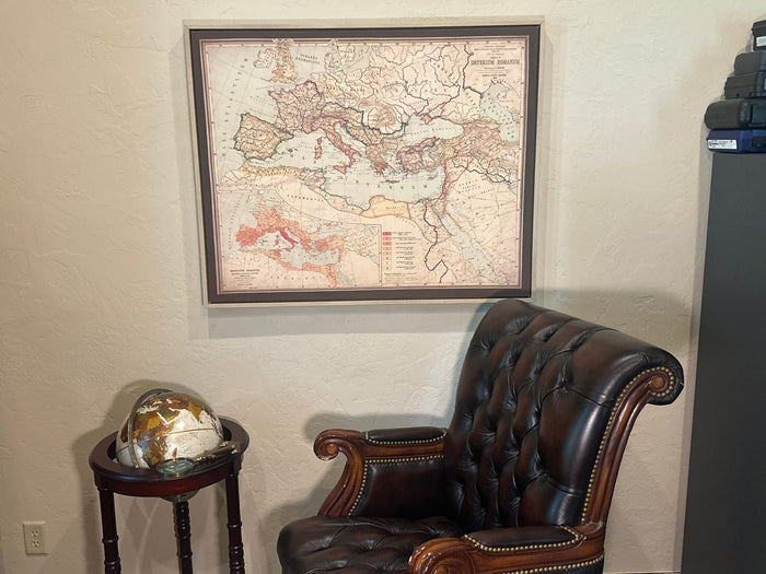 This image shows the aged version of the map, on a float framed canvas.