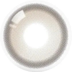 Seen from above, the round white grille’s circular mesh and central opening echo the subtle taupe brown pattern of Olola Purity Shine 1-Day Taupe Brown (10pk) contact lenses by Olola, with a gentle light reflection at the top left.