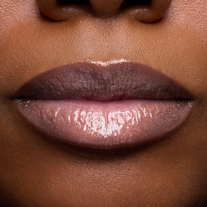 Close-up swatches of Colourpop Peach Mochi Fresh Kiss Glossy Balm on models’ lips, showing sheer peachy shimmer and high-shine finish, highlighting how this Lip Gloss & Lip Oil hybrid looks on different skin tones.