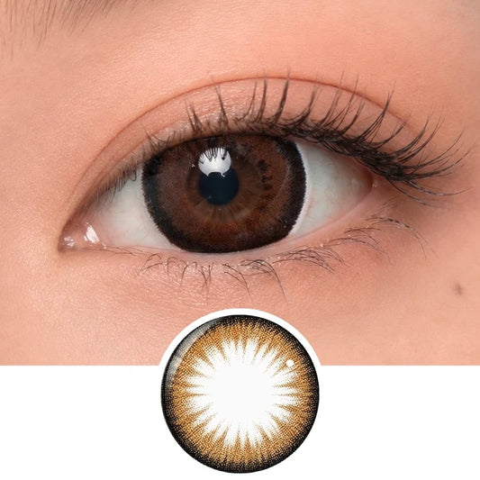 Close-up of eye wearing EyeCandys Bambi Almond Brown contact lens with detailed lens pattern and natural brown enlargement effect.