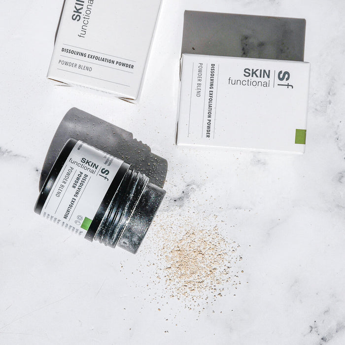 SKIN Functional dissolved exfoliation powder with details skincare product on a grey background