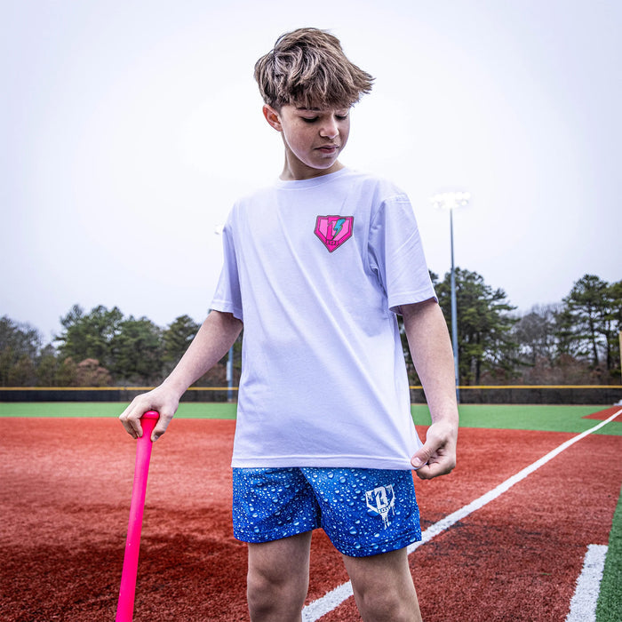 Youth model wearing white Rain Delay Lightning Bolt youth graphic tee